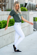KanCan Jeans  These high-rise white skinny jeans have a look and fit slim so you can show off your curves this summer. Pair with a denim jacket and oversized tee for a casual look. Color: White  Cut: Skinny, 30" Inseam* Rise: High-Rise, 9.5" Front Rise* 66.5% COTTON, 31.3% RAYON, 2.2% SPANDEX Stitching: Classic Fly: Zipper Style #: KC6009WT Contact us for any additional measurements or sizing.  *Measured on the smallest size, measurements may vary by size. 
