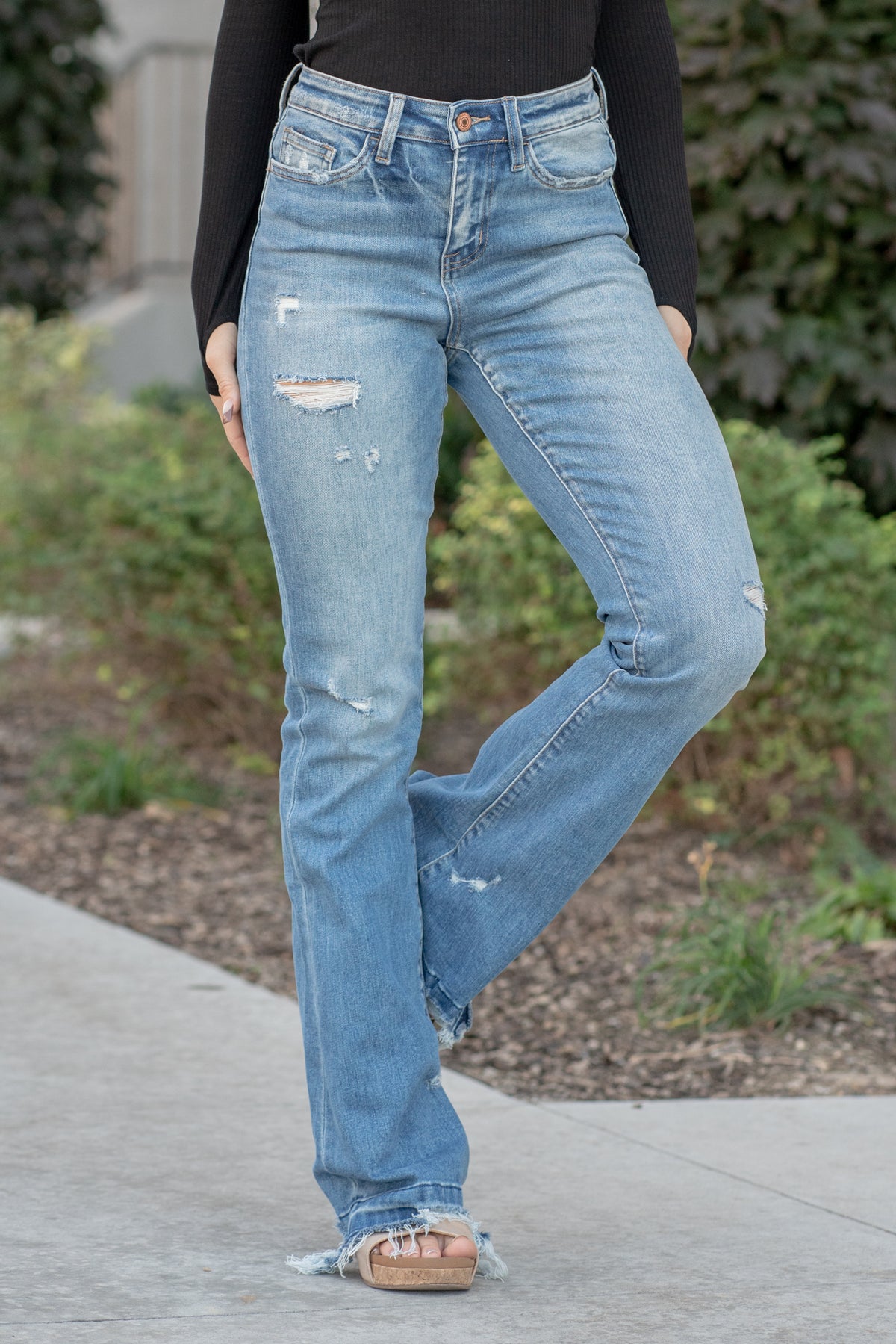 VERVET by Flying Monkey Jeans  This flare features a high rise with single button closure and a 34" inseam for length.  Flare, 34" Inseam*  Rise: High Rise, 10" Front Rise* Leg Opening: 21"* 93% COTTON , 5% POLYESTER , 2% SPANDEX Stitching: Classic  Fly: Zip Fly  Style #: T5435 *Measured on the smallest size, measurements may vary by size.  Contact us for any additional measurements or sizing.  Cas is 5'7" and wears a size 25 in jeans, a small in tops, and 8 in shoes. She is wearing size 25 in these jeans. 