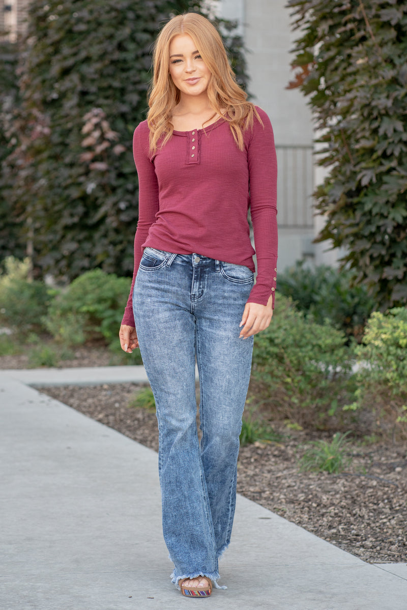 VERVET by Flying Monkey Jeans  This mid rise flare from VERVET is so fun with its frayed hem. Pair with heels and a blouse for a dressed up outlook. Skinny, 34" Inseam* Rise: Mid Rise, 9" Front Rise* Leg Opening: 25"* Material: 98% Cotton, 2% Spandex Stitching: Classic Fly: Zip Fly Style #: V2611 Contact us for any additional measurements or sizing. 
