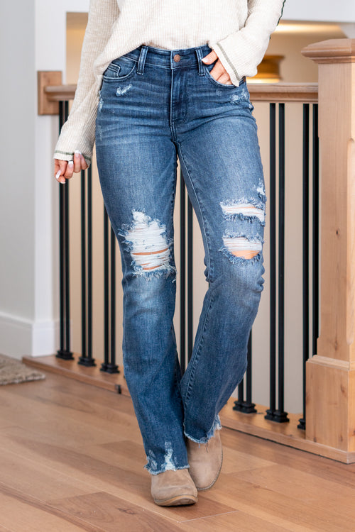 Judy Blue  Boot cuts are back in style and this cute high-rise is a perfect fit! With a medium blue whiskered wash, these are versatile and stretchy denim you will love. Color: Medium Blue Wash Cut: Boot Cut, 32" Inseam* Rise: Mid-Rise, 9.75" Front Rise* Material: 93% Cotton / 6% Polyester / 1% Spandex Machine Wash Separately In Cold Water Stitching: Classic Fly: Zipper Style #: JB82426-PL | 82426-PL