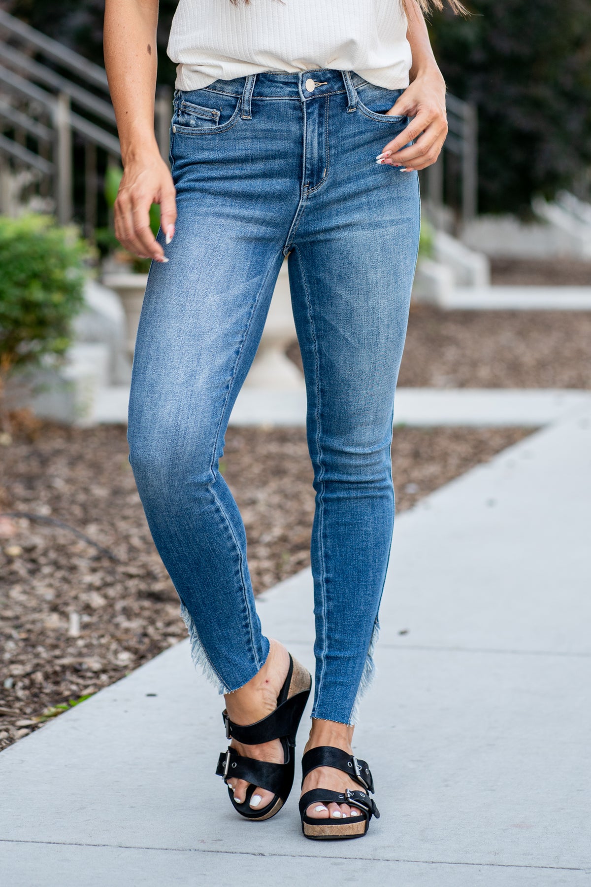 Judy Blue  Don't be afraid to wear high-waisted jeans with a medium blue wash and split hem detail, these will be your everyday go-to denim.   Color: Medium Wash Cut: Skinny, 28.5" Inseam*  Rise: High Rise 10.5" Front Rise* Material: 93% Cotton, 6% Polyester, 1% Spandex Machine Wash Separately In Cold Water Stitching: Classic Fly: Zipper Style #: JB88459 | 88459 *Measured on the smallest size, measurements may vary by size.  Contact us for any additional measurements or sizing.