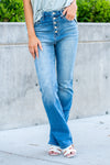 Cello Jeans  Cello goes totally retro with the new High Rise 5 Button Bootcut jeans. These jeans are slim through the hip and thigh for an extra flattering fit. They get updated with five-button closure with a bootcut leg so your '90s style is on-point. Crop Boot Cut Color: Medium Blue Wash  Cut: Boot Cut, 33" Inseam* Rise: High-Rise, 10" Front Rise* 99% COTTON 1% SPANDEX Fly: Zipper   Style #: AB38293M