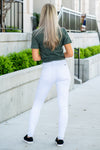 KanCan Jeans  These high-rise white skinny jeans have a look and fit slim so you can show off your curves this summer. Pair with a denim jacket and oversized tee for a casual look. Color: White  Cut: Skinny, 30" Inseam* Rise: High-Rise, 9.5" Front Rise* 66.5% COTTON, 31.3% RAYON, 2.2% SPANDEX Stitching: Classic Fly: Zipper Style #: KC6009WT Contact us for any additional measurements or sizing.  *Measured on the smallest size, measurements may vary by size. 