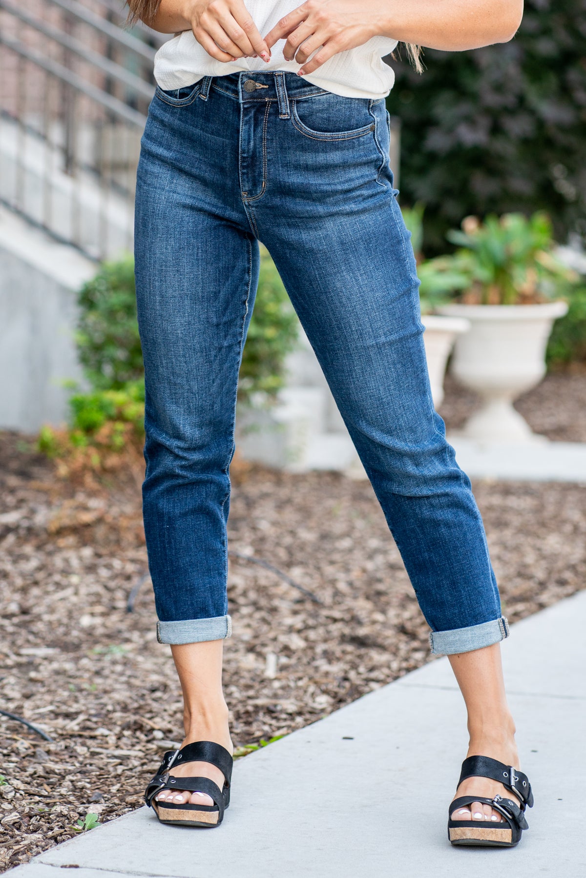 Judy Blue   These are the jeans everyone wants! A tuck you in a high rise with a  cuffed slim leg, these slim fits will be your new go-to denim.  Color: Dark Blue Wash Cut: Boyfriend, 25" Inseam Cuffed* 27" Inseam Uncuffed* Rise: High-Rise. 10.5" Front Rise* Material: 93% COTTON, 6% POLYESTER, 1% SPANDEX Machine Wash Separately In Cold Water Stitching: Classic Fly: Zipper Style #: JB82390 | 82390