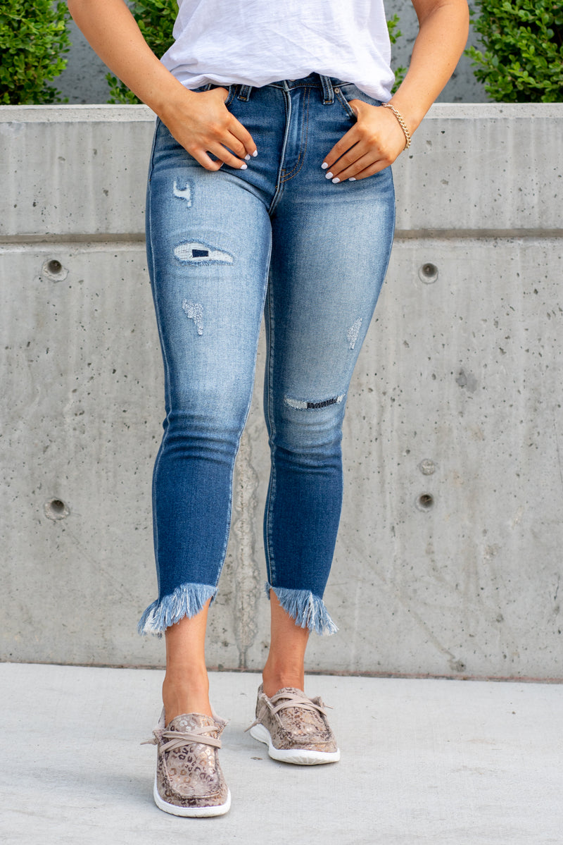 Kan Can Jeans  Style Name: Laredo Color: Dark Wash Cut: Ankle Skinny, 23.5" Inseam Rise: High-Rise, 9.5" Front Rise 90% COTTON 8% POLYESTER 2% SPANDEX Fly: Zipper  Style #: KC9204D Contact us for any additional measurements or sizing.  *Measured on the smallest size, measurements may vary by size.