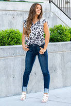 Judy Blue  A dark wash mid-rise skinny with a folded hem that can be unfolded to add length for longer inseams. Color: Medium Blue  Cut: Skinny fit, 28.5" Cuffed* | 32" Inseam Uncuffed* Mid Rise, 9.75" Front Rise* Material: 52% Cotton, 23% Polyester, 22% Rayon, 3% Spandex Stitching: Classic Fly: Zipper Fly Style #: JB82340 | 82340 Contact us for any additional measurements or sizing.    *Measured on the smallest size, measurements may vary by size.   