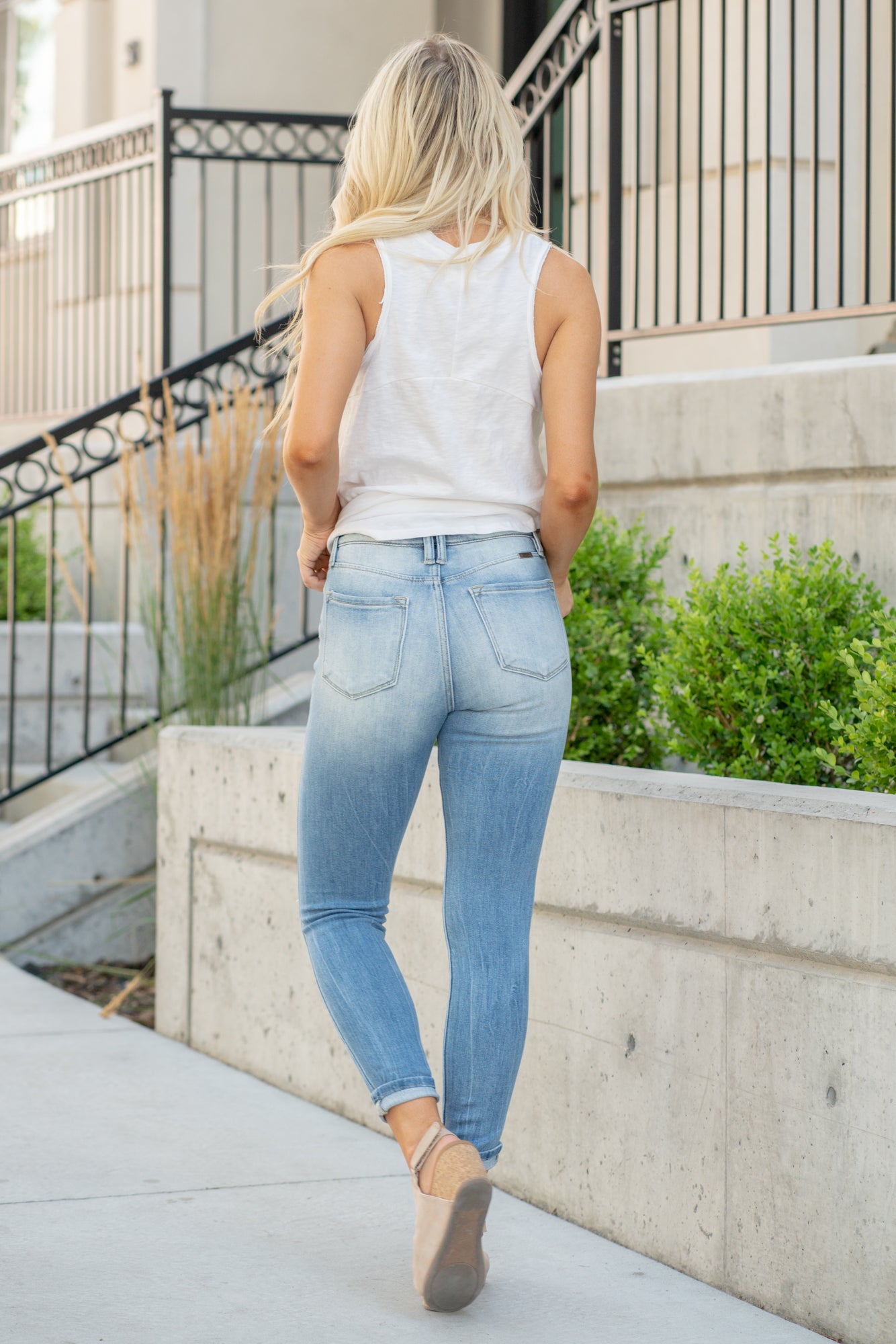 KanCan Jeans Color: Medium Wash Ankle Skinny, 26.5" Inseam* High Rise, 10.5" Front Rise* Belted Waist Cuffed Ankle 94% COTTON , 5% POLYESTER , 1% SPANDEX Fly: Zipper with Double Button  Style #: KC9284M *Measured on the smallest size, measurements may vary by size.  Contact us for any additional measurements or sizing.   Cas is 5'7" and wears a size 25 in jeans, a small in tops, and 8 in shoes. She is wearing a size 25 in these jeans.