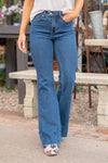 Judy Blue  Don't be afraid to wear high-waisted jeans, especially with this tummy control top fit. Carefully designed by Judy Blue to hold your tummy in for a slim look. With a medium blue wash, these will be your everyday go-to denim.   With catch-move-release technology, Judy Blues cool denim helps move moisture away from skin and releases it for quick evaporation. This fabric is breathable and moisture-wicking for cool, dry comfort.