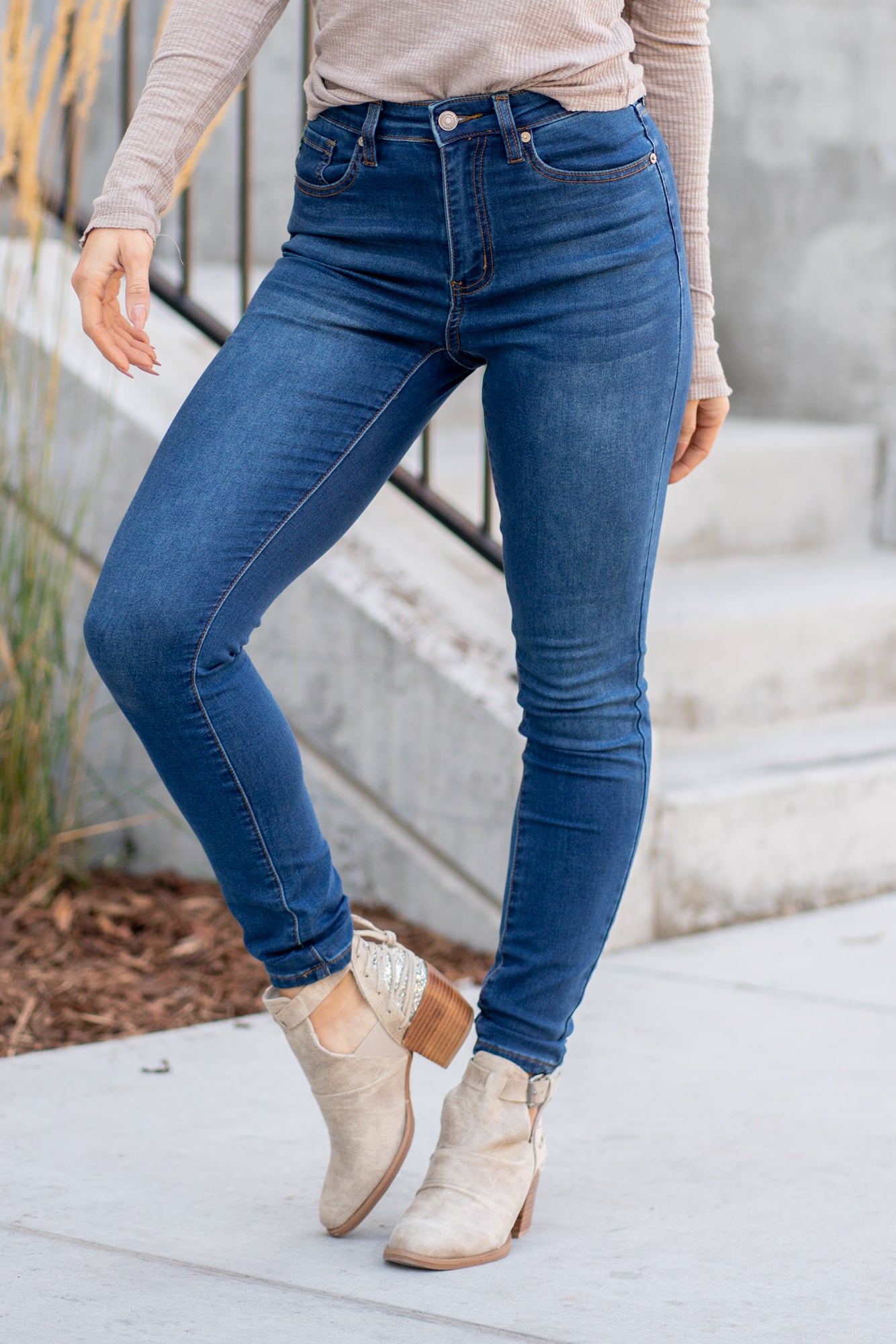 KanCan Jeans Collection: Core Style  Color: Dark Blue Wash Cut: Skinny, 30" Inseam* Rise: High Rise, 10.5" Front Rise* COTTON 66%, POLYESTER 33%, SPANDEX 1% Stitching: Classic Fly: Zipper  Style #: KC11253D Contact us for any additional measurements or sizing.    *Measured on the smallest size, measurements may vary by size. 