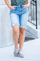 VERVET by Flying Monkey Jeans  These comfortable bermuda shorts have a distressed hem detail. Pair with a graphic tee and sandals. Shorts, 3.5" Inseam*   High Rise, 10" Front Rise* 98% Cotton, 2% Spandex Stitching: Classic Fly: Zipper  Style #: V2929 Contact us for any additional measurements or sizing.    *Measured on the smallest size, measurements may vary by size. 