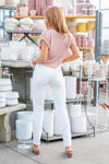KanCan Jeans  With a high waist and straight fit, these will be your go-to jeans that will never go out of style. Color: White Cut: Straight Fit, 28.5" Inseam* Rise: High-Rise, 10.75" Front Rise* 95% COTTON , 4% POLYESTER , 1% SPANDEX Fly: Zipper Style #: KC5217WT Contact us for any additional measurements or sizing.  *Measured on the smallest size, measurements may vary by size.  Sarah wears a size 25 in jeans, a small in tops, and 8 in shoes. She is wearing size 25 in these jeans.   