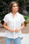 Hem & Thread   Color: Ivory Neckline: Button Down  Sleeve: Short 100% POLYESTER Style #: 32128FN-Ivory Contact us for any additional measurements or sizing.    Sarah is 5'5" and wears a size 25 in jeans, a small in tops, and 8 in shoes. She is wearing size small in this top. 
