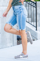 VERVET by Flying Monkey Jeans  These comfortable bermuda shorts have a distressed hem detail. Pair with a graphic tee and sandals. Shorts, 3.5" Inseam*   High Rise, 10" Front Rise* 98% Cotton, 2% Spandex Stitching: Classic Fly: Zipper  Style #: V2929 Contact us for any additional measurements or sizing.    *Measured on the smallest size, measurements may vary by size. 