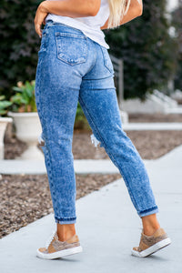 KanCan Jeans  These mom jeans will become your go-to! Pair these girlfriend mom fit with sandals and a tee for an easy summer look.  Color: Medium Blue Wash Cut: Straight Fit, 27" Inseam* Rise: High Rise, 11.75" Front Rise* 99% COTTON , 1% SPANDEX Fly: Zipper Style #: KC9304M Contact us for any additional measurements or sizing.  
