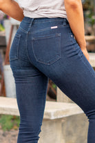 KanCan Jeans  These are the ones, the classic KanCan that can be dressed up or worn casually. Pair with heels and a front tuck for a night out.  Color: Dark Wash Cut: Fit Skinny, 27" Inseam  Rise: High Rise, 10" Front Rise 74% COTTON, 10% RAYON, 15% POLYESTER, 1% SPANDEX Stitching: Classic Fly: Zipper Fly Style #: KC20010SD