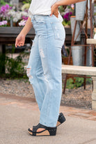 KanCan Jeans  With a high waist and straight fit, these will be your go-to jeans that will never go out of style. Color: Medium Blue  Cut: Straight Fit, 31" Inseam* Rise: High-Rise, 12.5" Front Rise* 100% Cotton, Rigid Denim Fly: Exposed Button Fly Style #: KC7912L Contact us for any additional measurements or sizing.  *Measured on the smallest size, measurements may vary by size.  Jacquelyn wears a size 25 in jeans, a small in tops, and 6.5 in shoes. She is wearing size 25 in these jeans.