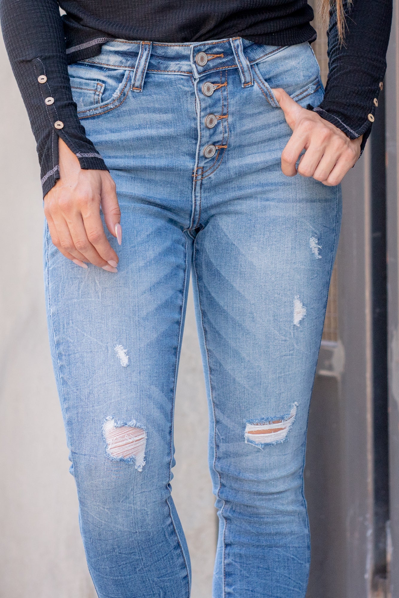 KanCan Jeans  Color: Medium Blue Wash Cut: Ankle Skinny, 27" Inseam Rise: High Rise, 9.5" Front Rise 74% COTTON 10%RAYON 15% POLYESTER 1% SPANDEX Machine Wash Separately In Cold Water Stitching: Classic Fly: Exposed Button Style #: KC9157M Contact us for any additional measurements or sizing.    *Measured on the smallest size, measurements may vary by size. 