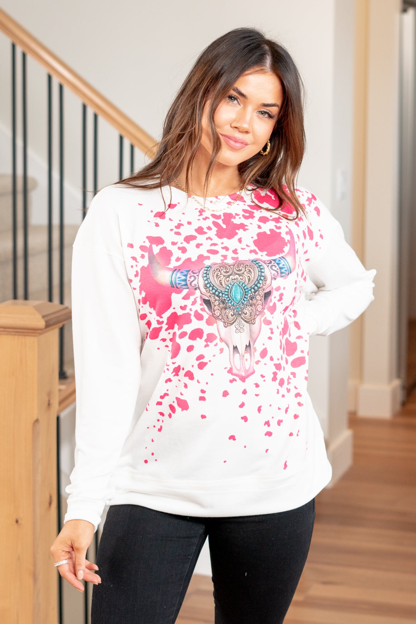 Longhorn Graphic Tee  Color: Ivory Neckline: Round Sleeve: Long Sleeve Material: 78%Polyester 18%Rayon 4%Spandex Contact us for any additional measurements or sizing.   