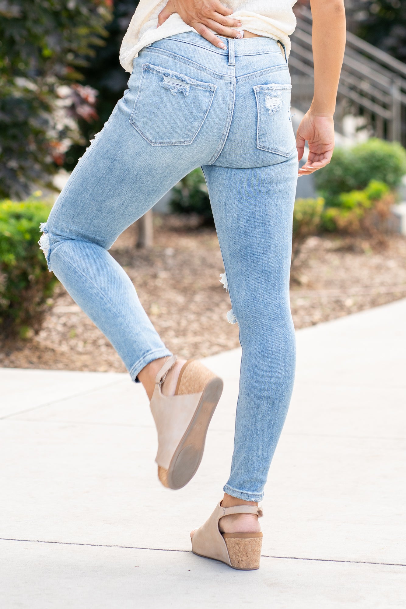 VERVET by Flying Monkey Jeans  This comfortable stretchy denim has a distressed detail, calf-hugging fit, fray hem bottom, and a 5 button-exposed fly with a distressed back pocket. Skinny Cut, 27" Inseam* Mid Rise, 9" Front Rise* 92%COTTON, 6%POLYESTER, 2%SPANDEX Machine Wash Separately In Cold Water Stitching: Classic Fly: Zipper Fly Style #: V2948 Contact us for any additional measurements or sizing.    *Measured on the smallest size, measurements may vary by size. 