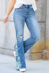VERVET by Flying Monkey Jeans  The Bella flare features a high rise with single button closure and a 34" inseam for length. These Bellas are in the Pound medium blue wash with floral panel color block. Pair with heels and a tank for an effortless dressed-up look.  Stretch Flare, 34" Inseam*  Rise: High Rise, 10" Front Rise* Leg Opening: 23"* Material: 92% COTTON 6% POLYESTER 2% SPANDEX Stitching: Classic  Fly: Zip Fly  Style #: V3092