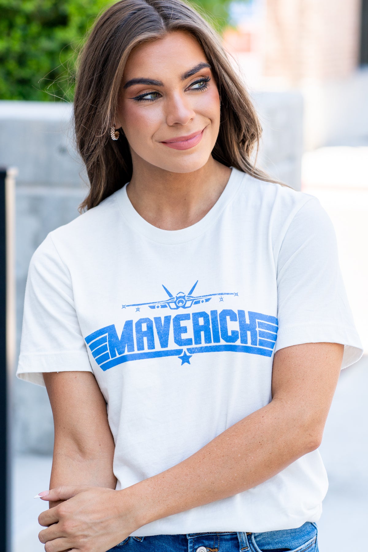 Maverick by Oat Collective   Graphic Tee   Color: Vintage White Neckline: Round   Sleeve: Short Sleeve  Fitted Tee 100% Premium Airlume combed cotton Style #: OT2206X777 Contact us for any additional measurements or sizing.    
