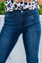 Judy Blue  A dark wash mid-rise skinny with a folded hem that can be unfolded to add length for longer inseams. Color: Medium Blue  Cut: Skinny fit, 28.5" Cuffed* | 32" Inseam Uncuffed* Mid Rise, 9.75" Front Rise* Material: 52% Cotton, 23% Polyester, 22% Rayon, 3% Spandex Stitching: Classic Fly: Zipper Fly Style #: JB82340 | 82340 Contact us for any additional measurements or sizing.    *Measured on the smallest size, measurements may vary by size.   