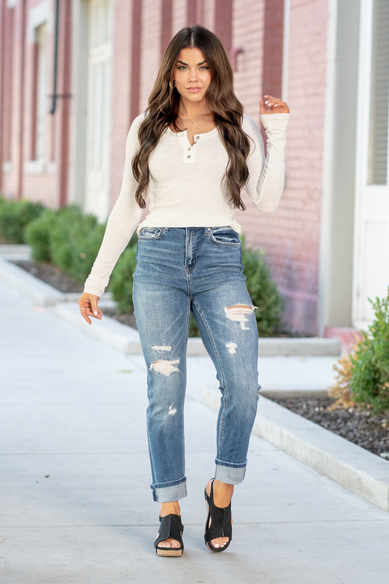 Denim by Zenana   Color: Medium Blue Wash   Cut: Mom Fit, 26.5" Inseam*  Rise: High-Rise, 11.25" Front Rise* Leg Opening: 13.25"* Material: 93% COTTON 5% POLYESTER 2% SPANDEX Fly: Zip Fly  Style #: DPP-1670MM Contact us for any additional measurements or sizing.  *Measured on the smallest size, measurements may vary by size.  Jacquelyn wears a size 25 in jeans, a small in tops, and 6.5 in shoes. She is wearing size 25 in these jeans