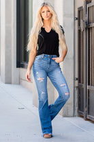 KanCan Jeans  You will love the way these flare cuts fit your curves. Dress up with heels and a cute flutter sleeve top for a night out.  Color: Medium Blue Cut: Flare Cut, 34" Inseam* Rise: High-Rise, 11" Front Rise* 98% COTTON, 2% SPANDEX Stitching: Classic Fly: Zipper Style #: KC9322M Contact us for any additional measurements or sizing. 