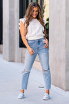 Vervet Flying Monkey Jeans  These high-waisted straight-leg jeans have a 90s vintage look. With distressed legs made with 100% cotton, these will give you that rigid denim feel on a fun silhouette.  Color: Medium Wash  Cut: Straight, 27* Rise: High Rise, 10.5" Front Rise* Material: 100% Cotton Machine Wash Separately In Cold Water Stitching: Classic Fly: Zipper Style #: VT1176 Contact us for any additional measurements or sizing.  *Measured on the smallest size, measurements may vary by size.