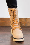 Boots by Mi.iM  LEATHER LACES DISTINGUISH THIS STYLE FROM THE CLASSIC MILITARY BOOT —while a chunky treaded platform heel makes every step a statement. Fitted with our signature padded footbed, they're a must for all day comfort with wear. Man-made Upper Color: Latte Padded footbed Shaft Height: 2.5" Contact us for any additional measurements or sizing. 