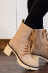 Boots by Mi.iM  LEATHER LACES DISTINGUISH THIS STYLE FROM THE CLASSIC MILITARY BOOT —while a chunky treaded platform heel makes every step a statement. Fitted with our signature padded footbed, they're a must for all day comfort with wear. Man-made Upper Color: Latte Padded footbed Shaft Height: 2.5" Contact us for any additional measurements or sizing. 