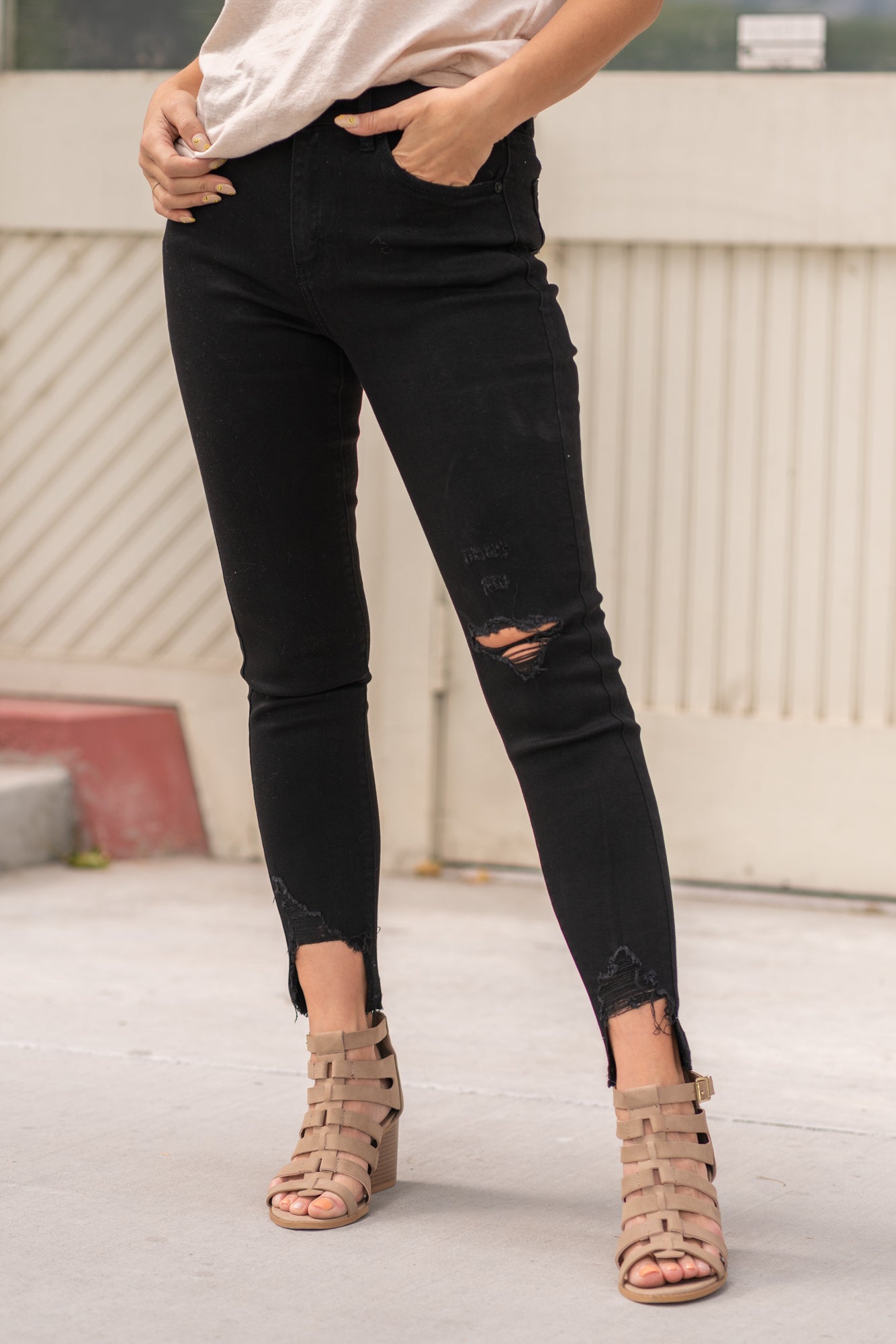KanCan Jeans  Color: Black Cut: Ankle Skinny, 27.5" Inseam Rise: High-Rise, 9.5" Front Rise Material: COTTON 38% LY 31.2% POLYESTER 29% SPANDEX 1.2% Detail: Step-Hem and Distressed Ripped Legs Fly: Zipper Fly Style #: KC7283BK Contact us for any additional measurements or sizing.