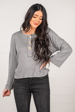 Blu Pepper Color: Grey Button Up  Drop Sleeve Round Neckline Button Up Long Sleeve 95% POLYESTER 5% SPANDEX Style #: B1ST1187 Contact us for any additional measurements or sizing.