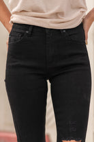KanCan Jeans  Color: Black Cut: Ankle Skinny, 27.5" Inseam Rise: High-Rise, 9.5" Front Rise Material: COTTON 38% LY 31.2% POLYESTER 29% SPANDEX 1.2% Detail: Step-Hem and Distressed Ripped Legs Fly: Zipper Fly Style #: KC7283BK Contact us for any additional measurements or sizing.