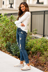 Judy Blue  These distressed relaxed fit jeans will be your comfiest Judy Blues yet! With relaxed legs and a mid-waist, you will want to wear these every day!   Color: Dark Blue Cut: Boyfriend, 29" Inseam* Rise: Mid Rise. 9.5" Front Rise* Material: 91% COTTON,7% POLYESTER,2% RAYON Machine Wash Separately In Cold Water Stitching: Classic Fly: Zipper Style #: JB88304-PL , 88304-PL Contact us for any additional measurements or sizing. 
