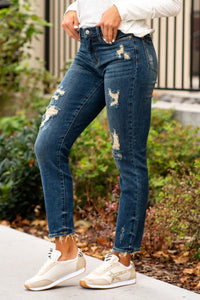 Judy Blue  These distressed relaxed fit jeans will be your comfiest Judy Blues yet! With relaxed legs and a mid-waist, you will want to wear these every day!   Color: Dark Blue Cut: Boyfriend, 29" Inseam* Rise: Mid Rise. 9.5" Front Rise* Material: 91% COTTON,7% POLYESTER,2% RAYON Machine Wash Separately In Cold Water Stitching: Classic Fly: Zipper Style #: JB88304-PL , 88304-PL Contact us for any additional measurements or sizing. 