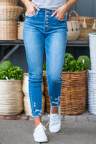 VERVET by Flying Monkey Jeans  Comfort-stretch denim, high rise waist, Skinny fitted legs with a light blue wash. Skinny, 27" Inseam* Rise: High Rise, 10" Front Rise* 98% Cotton, 2% Spandex Machine Wash Separately In Cold Water Stitching: Classic  Fly: Zipper     Style #: T5199 Contact us for any additional measurements or sizing.    *Measured on the smallest size, measurements may vary by size. 