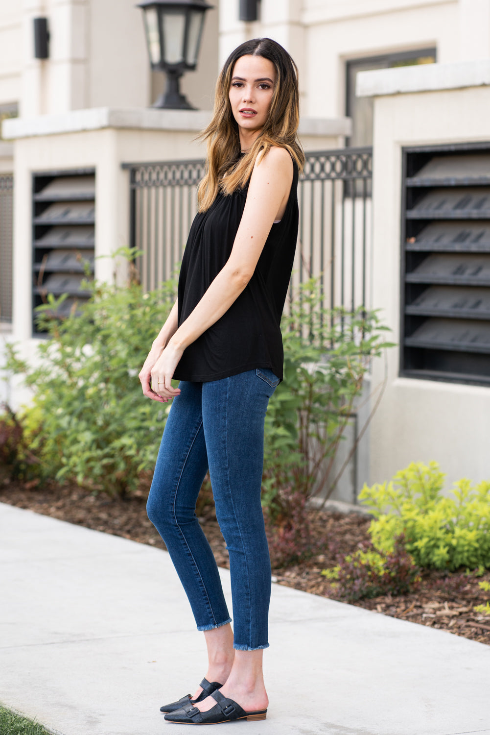 Miss Sparkling  Pair this tank with skinny jeans and strappy sandals for a perfect summer look.  Collection: Spring 2021 Color: Black Neckline: High Round Neck Sleeve: Tank 100% Polyester  Style #: D2050486 Contact us for any additional measurements or sizing.  