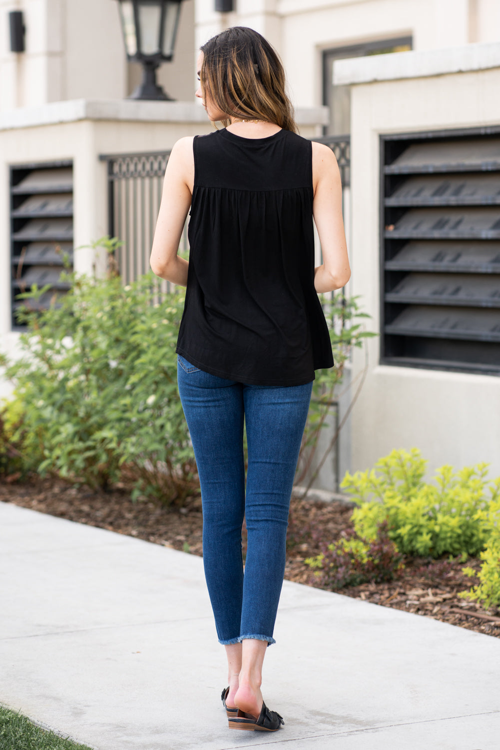 Miss Sparkling  Pair this tank with skinny jeans and strappy sandals for a perfect summer look.  Collection: Spring 2021 Color: Black Neckline: High Round Neck Sleeve: Tank 100% Polyester  Style #: D2050486 Contact us for any additional measurements or sizing.  