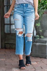Vervet Flying Monkey Jeans  These high-rise straight distressed jeans are so cute for spring. Pair with sandals and a tank for a casual day-out look.  Style Name: The Pink Knif Color: Light Blue Wash  Cut: Ankle Skinny, 26" Rise: Suoer High-Rise, 11" Front Rise Material: 98% Cotton, 2% Spandex Machine Wash Separately In Cold Water Stitching: Classic Fly: Zip Fly Style #: T5434 Contact us for any additional measurements or sizing.  *Measured on the smallest size, measurements may vary by size.