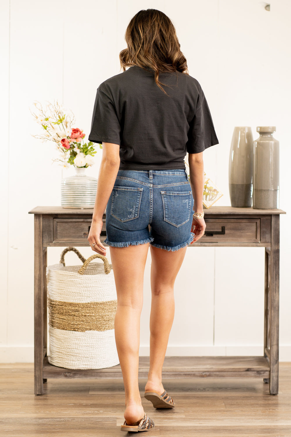 KanCan Jeans Collection: Spring 2021 Color: Dark Blue Shorts Cut: Shorts, 4.5" Inseam Rise: High Rise, 9.75" Front Rise 98%COTTON 2%SPANDEX Stitching: Classic Fly: Zip Fly  Style #: KC8607D Contact us for any additional measurements or sizing.  Taylor wears a size 3 in jeans, a small top, and 8.5 in shoes. She is wearing a size small in these shorts.