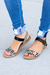 Sandals by Qupid Style Name: Athena Color: Zebra, Black Cut: Band Sandals with Strappy  Flat Heel Material. Outsole: Rubber Upper: Textile/Manmade  Contact us for any additional measurements or sizing.