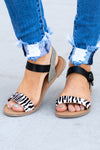 Sandals by Qupid Style Name: Athena Color: Zebra, Black Cut: Band Sandals with Strappy  Flat Heel Material. Outsole: Rubber Upper: Textile/Manmade  Contact us for any additional measurements or sizing.