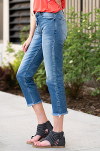KanCan Jeans These crop jeans will become your go-to! With little spandex, these jeans will mold your body shape and feel amazing. Pair with sandals or tennies, you cant go wrong with a high-rise straight like these. Collection: Spring 2021 Color: Medium Blue Wash Cut: Straight Fit, 26" Inseam  Rise: High-Rise, 10.5" Front Rise 99% COTTON/ 1% SPANDEX Fly: Zipper Style #: KC8638M Contact us for any additional measurements or sizing.  