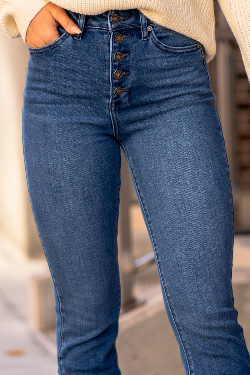KanCan Jeans  KanCan Comfort Stretch Color: Medium Blue Cut: Boot Cut, 32" Inseam* Rise: High-Rise, 11" Front Rise* COTTON 94% POLYESTER 4% SPANDEX 2% Stitching: Classic  Fly: Zipper Style #: KC7138M Contact us for any additional measurements or sizing.  *Measured on the smallest size, measurements may vary by size.