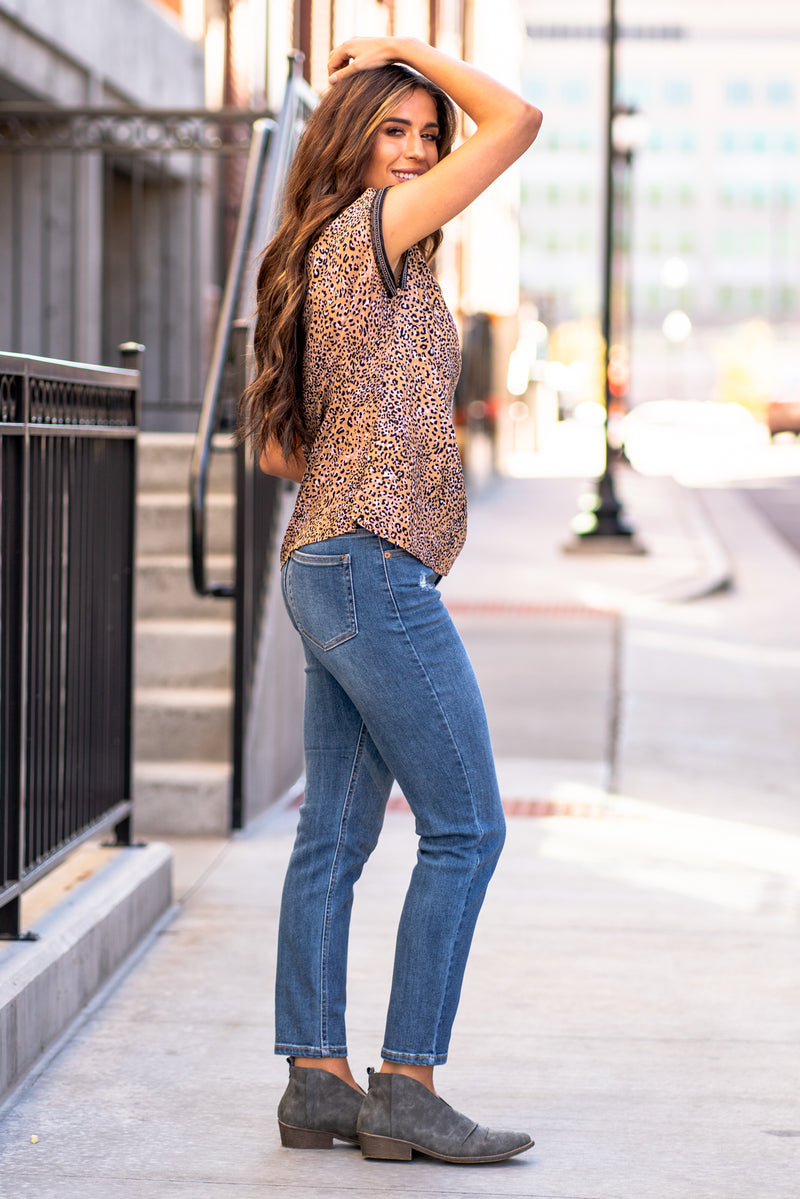 Hem & Thread   This tee has a little extra with its beaded edge and leopard print. Pair with your favorite jeans and booties for an early fall vibe.   Neckline: Round Neck Sleeve: Short Drop Sleeve  100% RAYON Style #: 31190W-Leopard Contact us for any additional measurements or sizing.