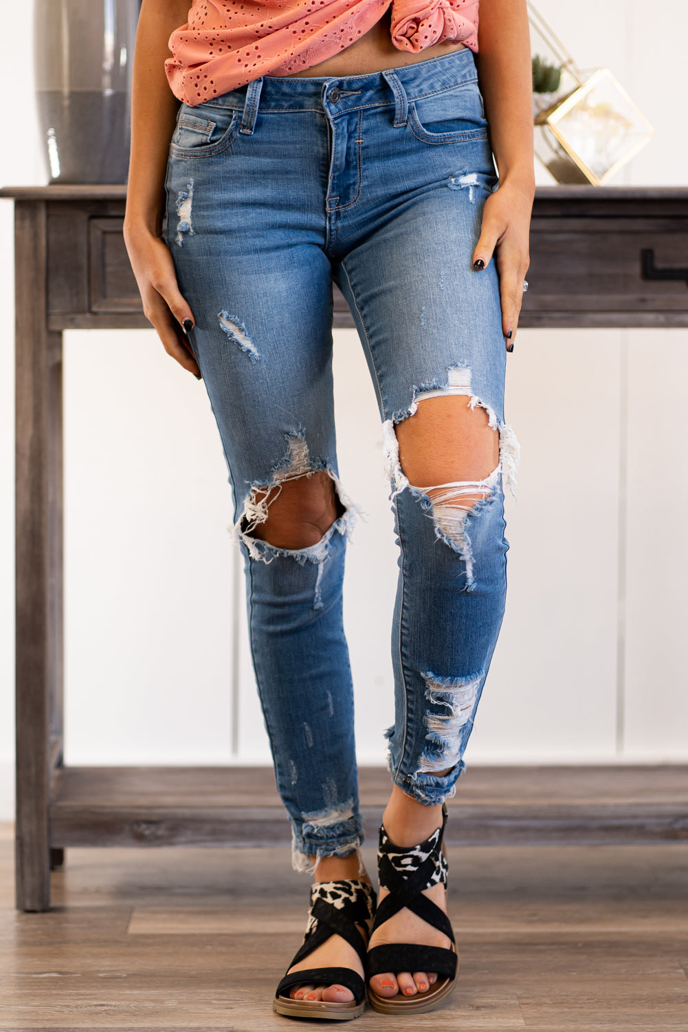 Cello Jeans  These jeans can be flattering, trendy and comfy. You can both dress up and dress down with body suit or crop top. Collection: Spring 2021 Color: Light Blue Wash Cut: Crop Ankle Skinny, 26.5" Inseam Rise: Mid-Rise, 8.5" Front Rise 98% COTTON 2% SPANDEX Fly: Zipper Style #: WV75236LTD Contact us for any additional measurements or sizing.  Haley wears a size small top, a 1 in jeans, and a small in tops. She is wearing a size 1 in these jeans.