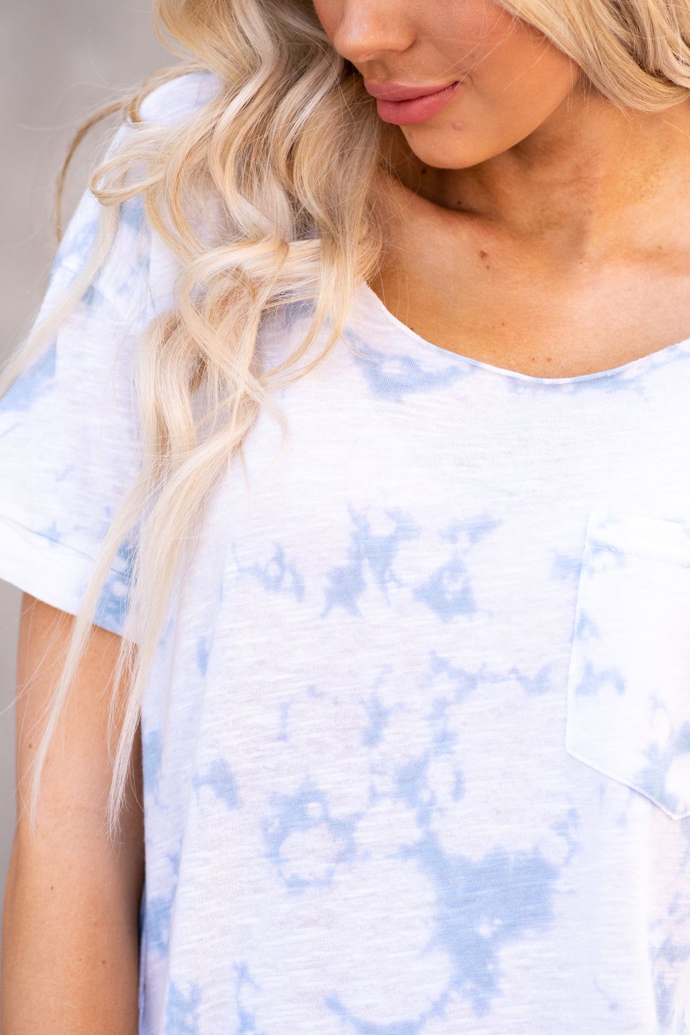 Mystree  This wide neck rolled sleeve top is a fun way to add color to your summer wardrobe!  Collection: Spring 2021 Color: Icy Blue Neckline: Wide Round Sleeve: Rolled Sleeves 60% Polyester, 25% Cotton, 15% Rayon Style #: 19046-Blue  Contact us for any additional measurements or sizing.