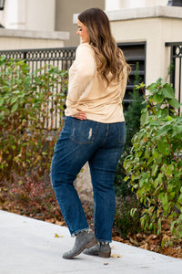 Judy Blue  These distressed boyfriend jeans will be your comfiest Judy Blues yet! With relaxed legs and a mid-waist, you will want to wear these every day!   Color: Dark Blue Cut: Boyfriend, 29" Inseam* Rise: Mid Rise. 9.5" Front Rise* Material: 91% COTTON,7% POLYESTER, 2% RAYON Machine Wash Separately In Cold Water Stitching: Classic Fly: Zipper Style #: JB88305-PL , 88305-PL Contact us for any additional measurements or sizing.   *Measured on the smallest size, measurements may vary by size. 
