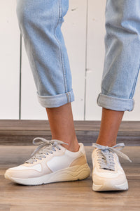 Oasis Society Sneakers by Mi.iM White & Beige Man-made upper Man-made insole Rubber outsole Shaft Height: 2.25 inch Heel Height: 1.5 inch Closures: lace up  Contact us for any additional measurements or sizing. 